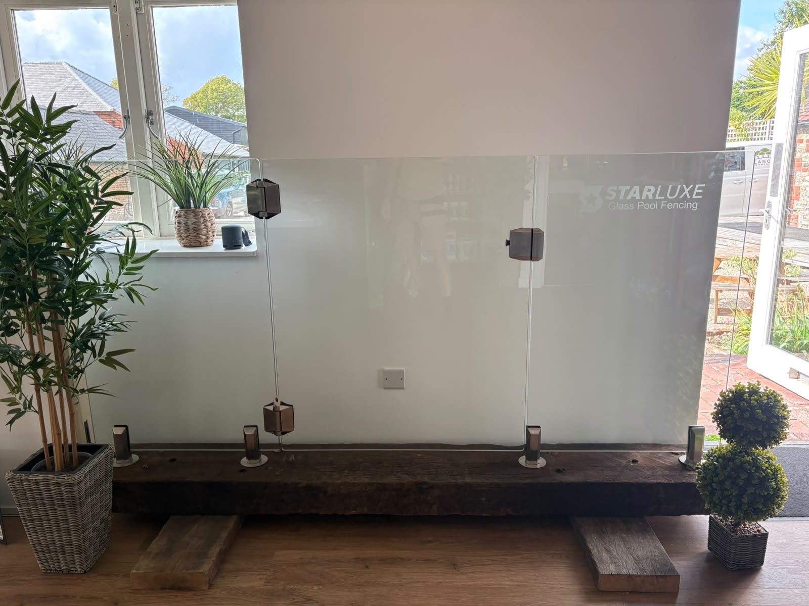Glass pool fencing on display in the StarLuxe showroom
